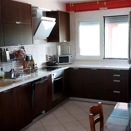 Δωμάτια σε οικογενειακή κατοικία Koukmaris House Επανωμή